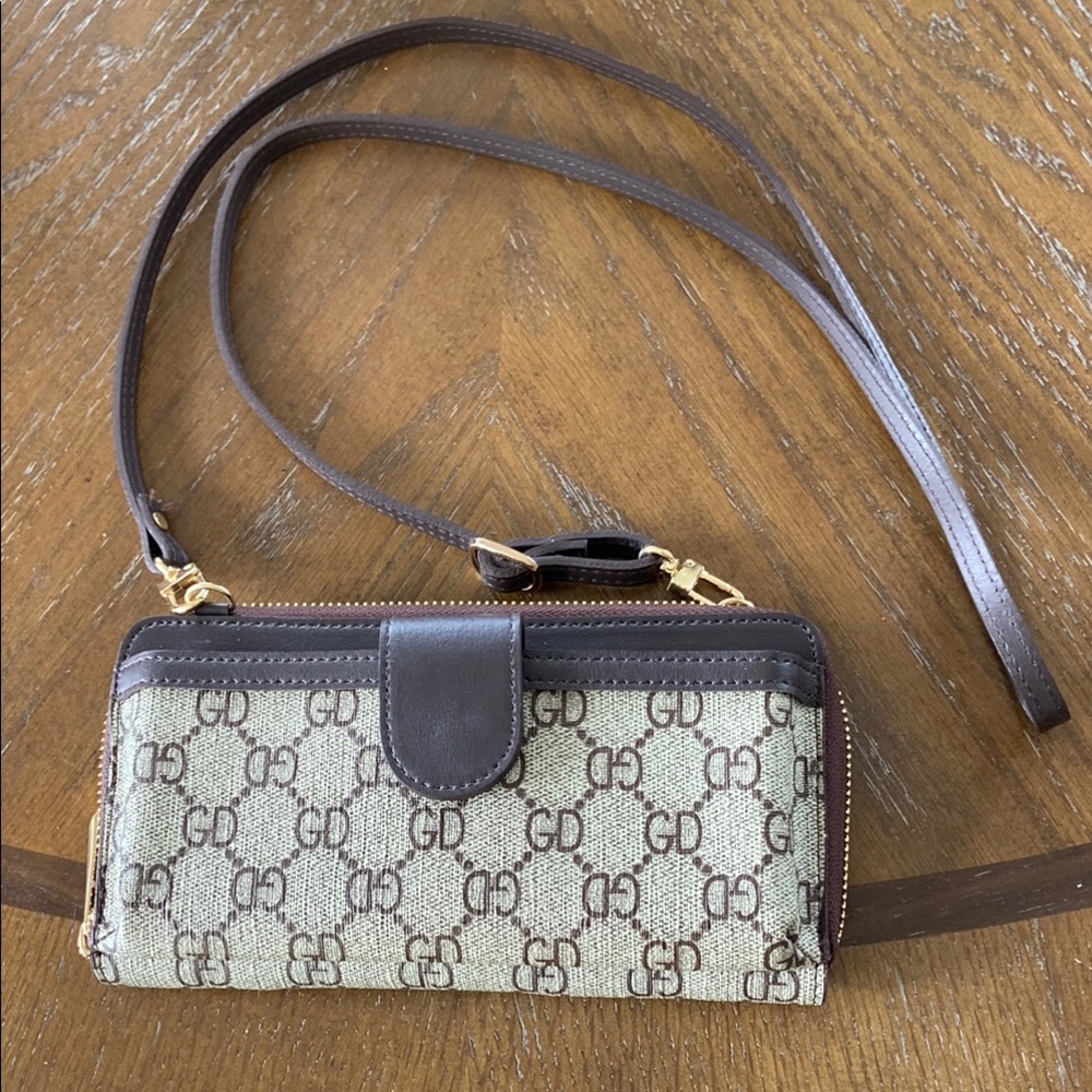 Kane-M small crossbody or wallet-style bag 
Brown and Tan Women's Crossbody Bag